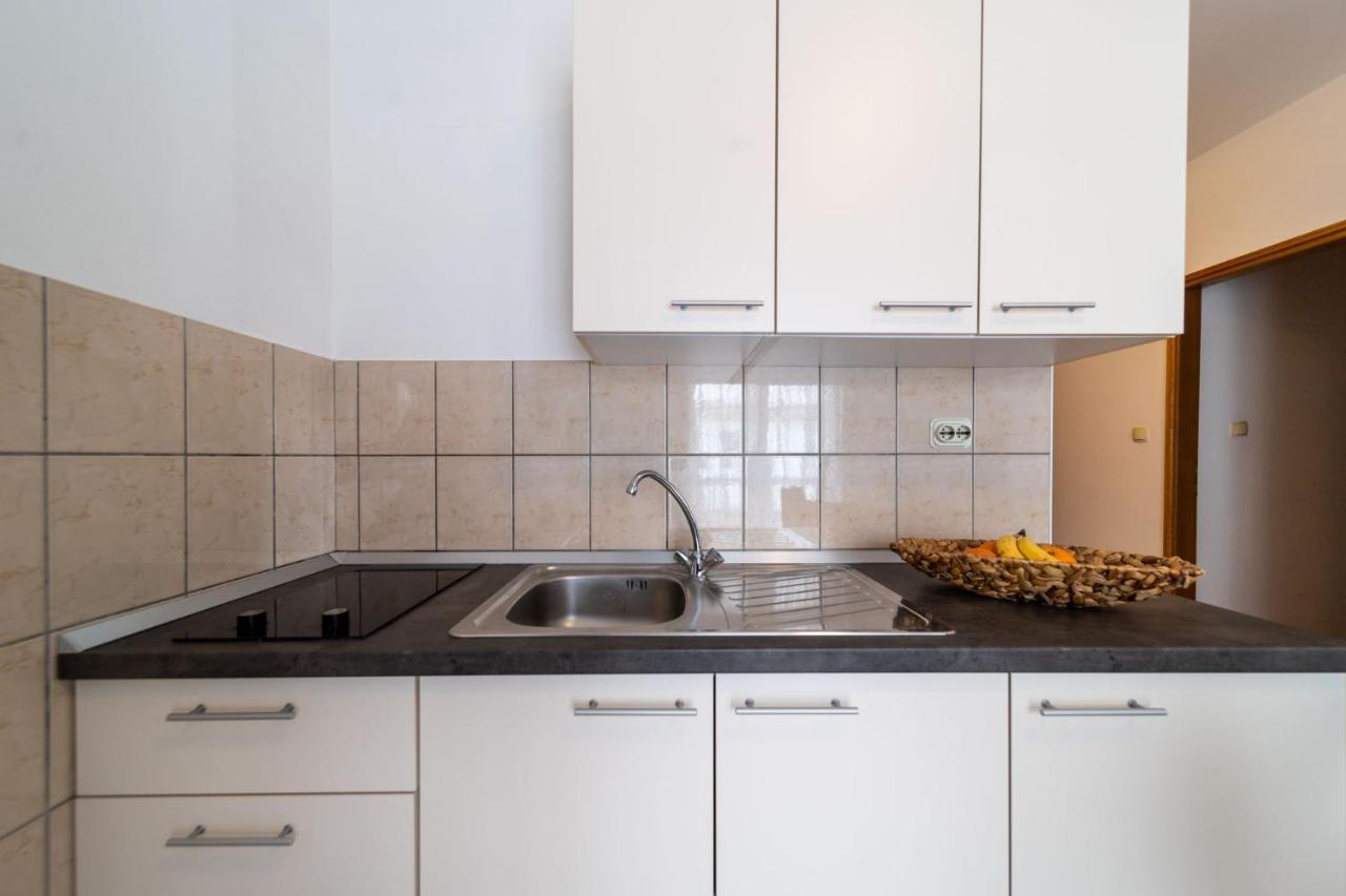 Apartmani Devcic Palit Buitenkant foto