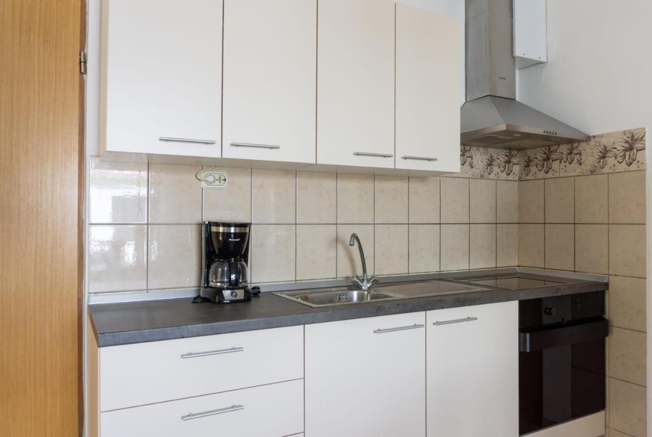 Apartmani Devcic Palit Buitenkant foto